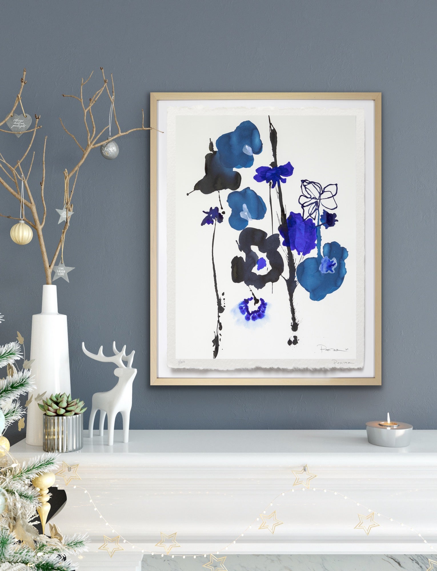 Framed abstract floral artwork with Christmas and holiday decorations