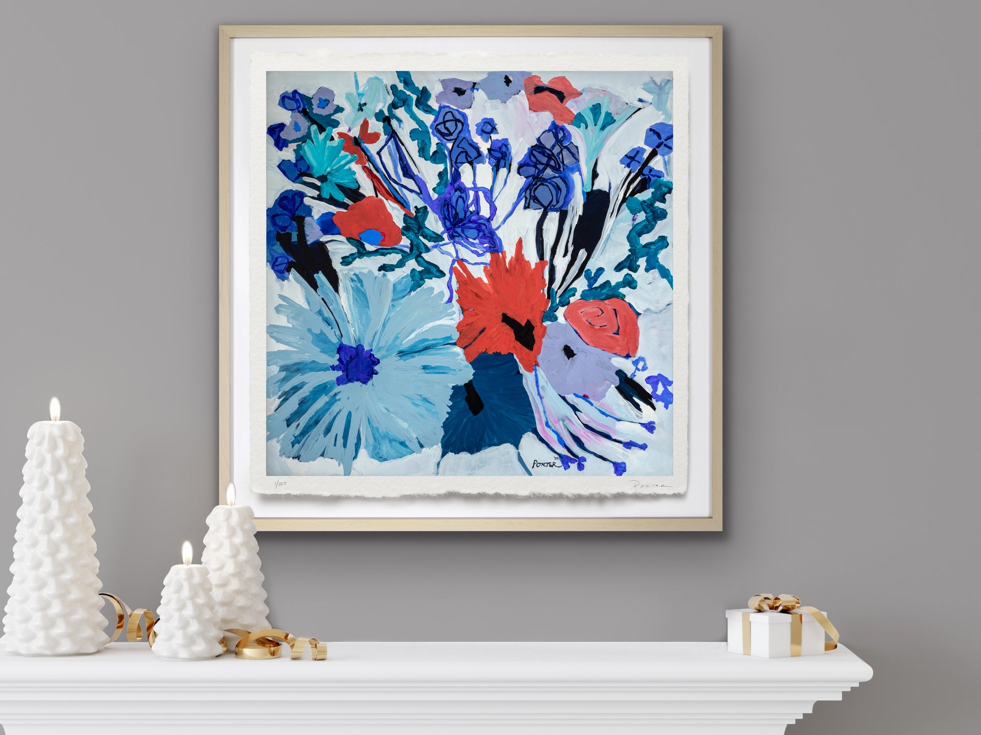 Framed abstract floral artwork with colorful flowers on a gray wall above a white mantel, Christmas decorations