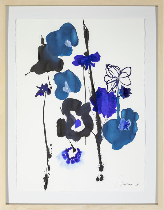 Framed artwork of blue and black floral abstract design on a white background